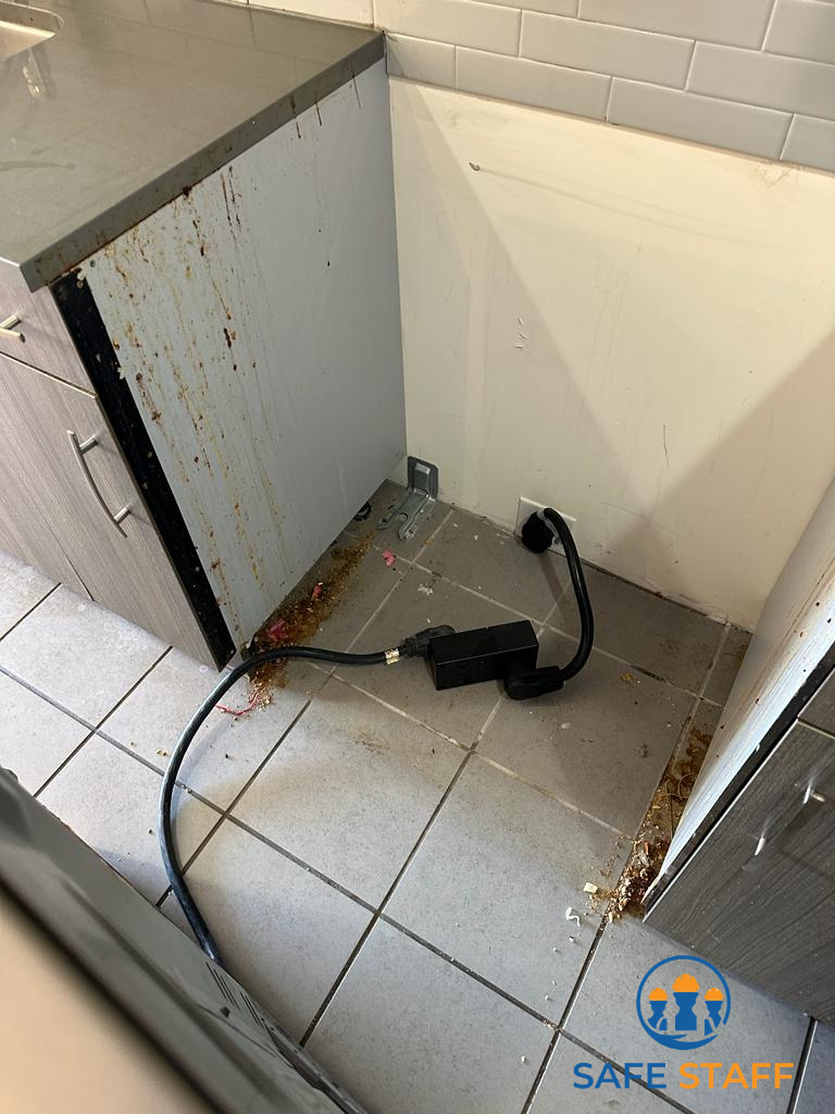 Before – kitchen floor and cabinetry | Safe Staff Property Management
